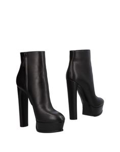 Полусапоги и высокие ботинки Casadei