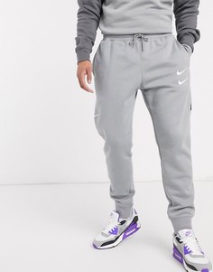 Серые джоггеры с манжетами и логотипом Nike SUIT 20-Серый