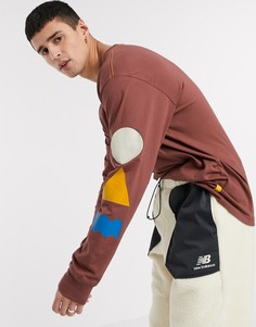Красный лонгслив New Balance Athletics Trail
