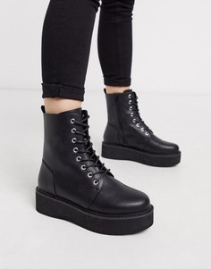 Черные ботильоны со шнуровкой на массивной подошве ASOS DESIGN-Черный