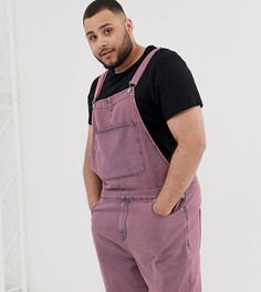 Розовый короткий джинсовый комбинезон с эффектом кислотной стирки ASOS DESIGN Plus