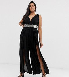 Черный пляжный комбинезон с глубоким вырезом и отделкой River Island Plus