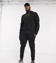 Черный спортивный костюм с ярко-оранжевыми завязками ASOS DESIGN Plus