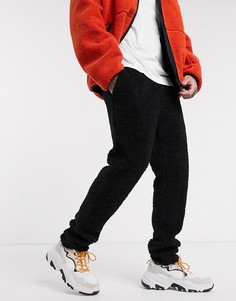 Плюшевые зауженные джоггеры черного цвета ASOS DESIGN-Черный