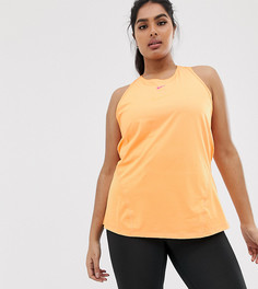 Оранжевый топ Nike Training