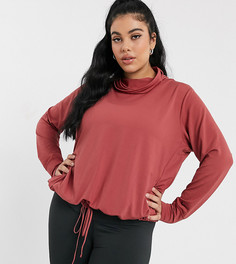 Розовый лонгслив Nike Plus Yoga