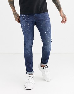 Темно-синие джинсы скинни с принтом в стиле брызг краски ASOS DESIGN-Синий