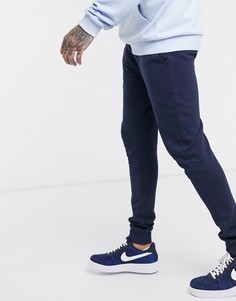Темно-синие джоггеры скинни из органического хлопка ASOS DESIGN-Темно-синий