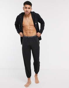 Черные джоггеры с манжетами от комплекта Calvin Klein CK One-Черный