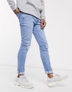 Темные суженные книзу джинсы скинни с эффектом кислотной стирки Levis-Синий Levis®