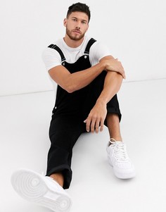 Черный джинсовый комбинезон свободного кроя ASOS DESIGN