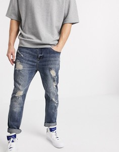 Темно-синие суженные книзу рваные джинсы ASOS DESIGN-Синий