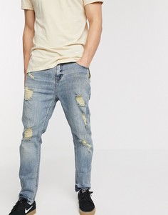 Голубые суженные книзу рваные джинсы ASOS DESIGN-Синий