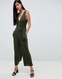 Комбинезон в рубчик с V-образным вырезом и пуговицами ASOS DESIGN-Зеленый