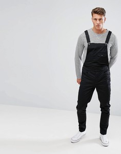 Черный джинсовый комбинезон зауженного кроя ASOS DESIGN
