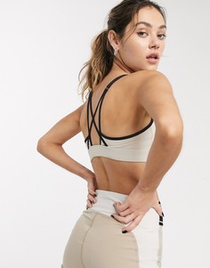 Кремовый спортивный бюстгальтер с ремешками Reebok Training