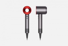 Фен в красном чехле Dyson