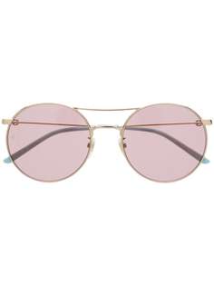 Gucci Eyewear солнцезащитные очки GG0680S в круглой оправе