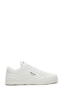 Белые стеганые кеды Prada