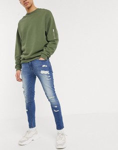 Синие выбеленные эластичные джинсы с рваной отделкой ASOS DESIGN-Синий