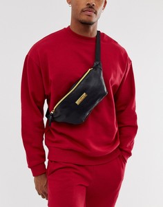 Черная сумка-кошелек через плечо из искусственной кожи с золотистой молнией и металлическим логотипом ASOS DESIGN-Черный
