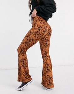Расклешенные леггинсы с размытым анималистичным принтом ASOS DESIGN-Мульти