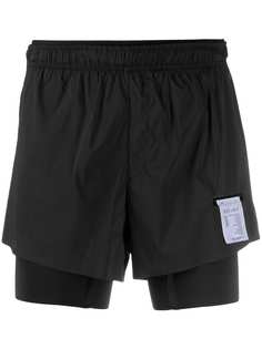 Satisfy layered running shorts