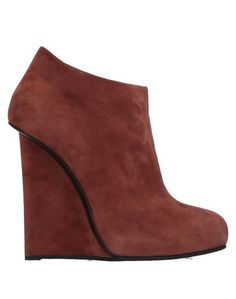 Полусапоги и высокие ботинки Giuseppe Zanotti
