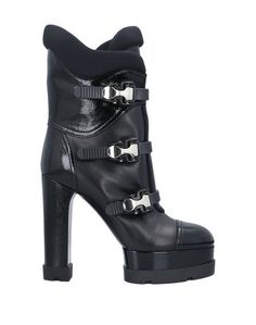 Полусапоги и высокие ботинки Casadei