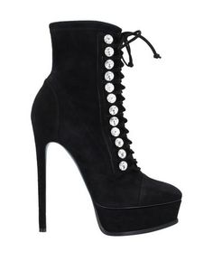 Полусапоги и высокие ботинки Casadei