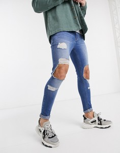 Синие джинсы стретч с напылением и рваной отделкой ASOS DESIGN-Синий