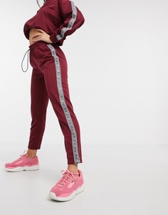 Красные спортивные штаны с фирменной лентой от комплекта Juicy Couture-Красный