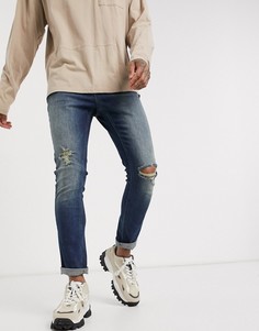 Темные джинсы скинни с рваной отделкой на коленях ASOS DESIGN-Синий
