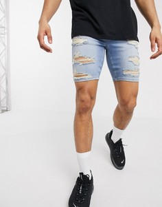 Светло-синие джинсовые шорты скинни с прорехами ASOS DESIGN-Синий