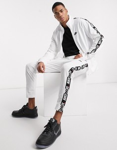 Белые джоггеры с манжетами и надписью "Just Do It" на ленте Nike-Белый