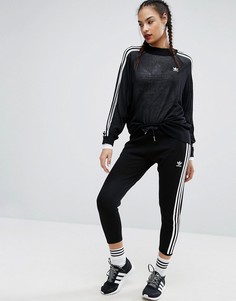 Легкие трикотажные брюки-сигаретки adidas Originals Adicolor Deluxe-Черный