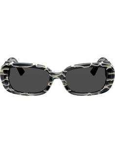 Valentino Eyewear солнцезащитные очки в овальной оправе с логотипом VLogo