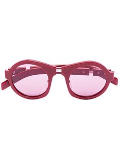 Prada Eyewear солнцезащитные очки в круглой оправе с затемненными линзами