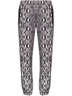 Adam Selman Sport спортивные брюки Unisex о змеиным принтом