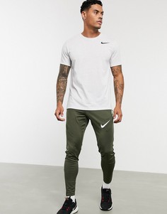 Узкие джоггеры цвета хаки Nike Football Strike-Зеленый