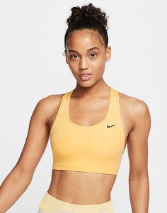 Желтый бюстгальтер с логотипом-галочкой Nike Training