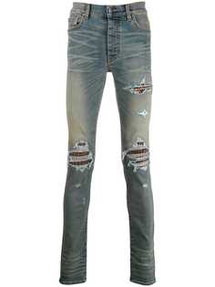 AMIRI джинсы скинни MX1 с прорезями