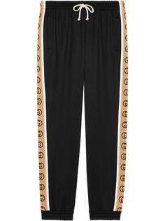 Gucci спортивные шорты с логотипами на лампасах