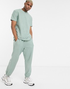 Темно-зеленые oversized-джоггеры от комплекта из фактурного трикотажа ASOS DESIGN-Зеленый