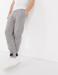Серые oversized-джоггеры с хлястиками на манжетах ASOS DESIGN-Серый