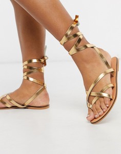 Золотистые кожаные сандалии с ремешками ASOS DESIGN-Золотой