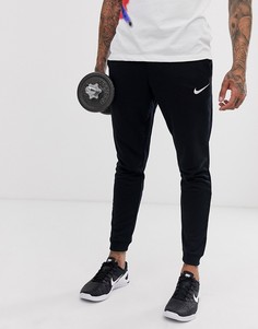 Черные суженные книзу брюки из флиса Nike Training-Черный