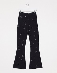Расклешенные леггинсы с луной ASOS DESIGN-Мульти