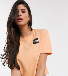 Оранжевый кроп-топ The North Face эксклюзивно на ASOS