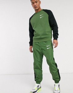 Джоггеры цвета хаки с манжетами и логотипом-галочкой Nike-Зеленый